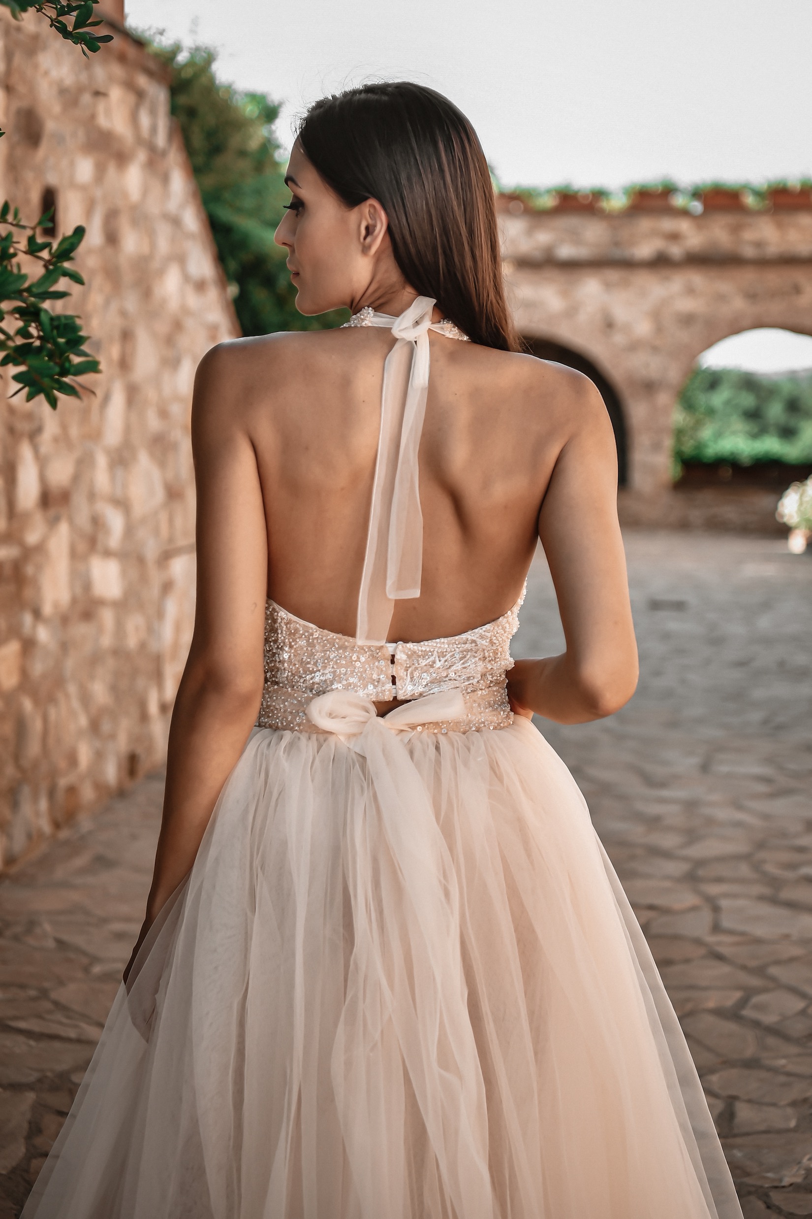 ORSOYA Bridal Dress: Halter neck bridal dress with tulle skirt.
