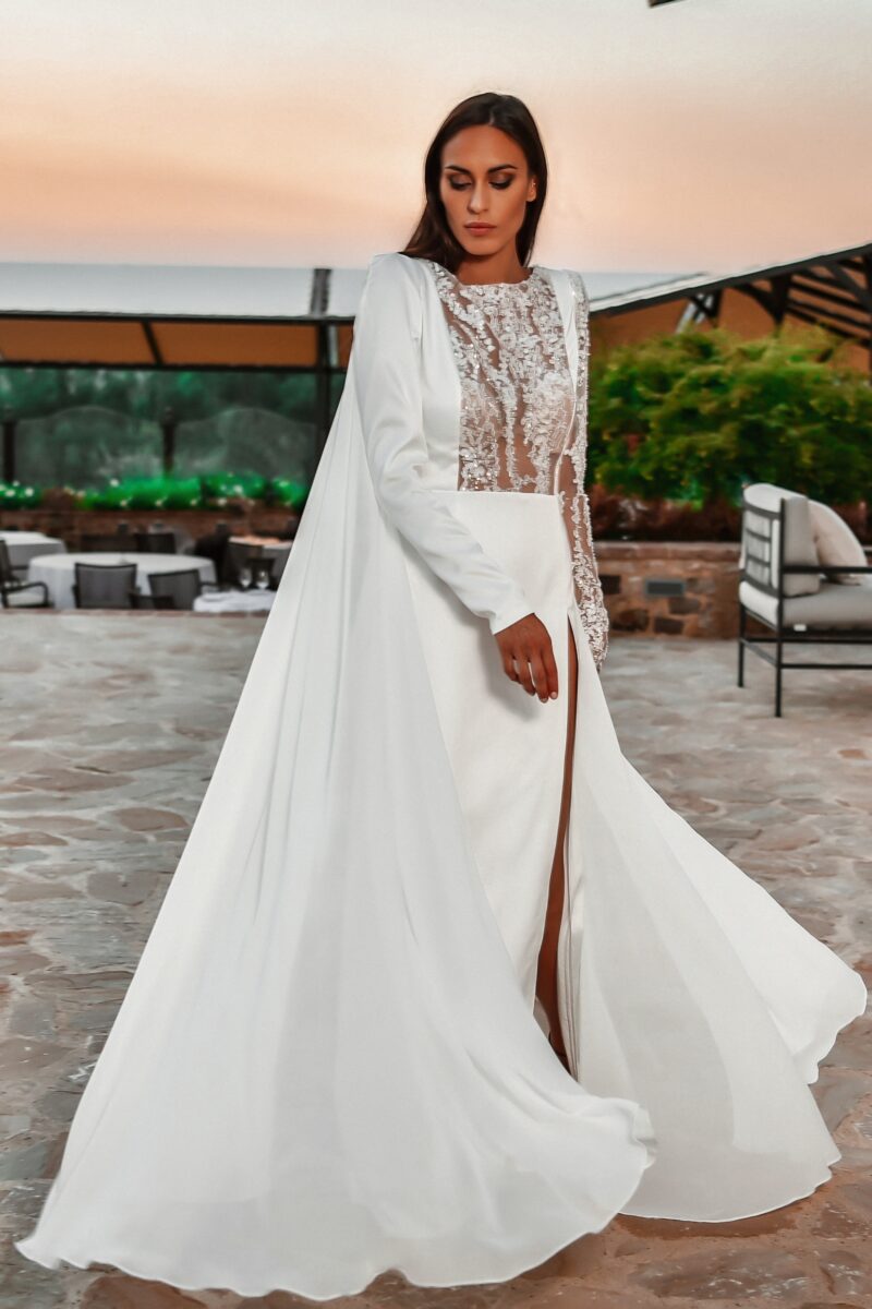 ORSOYA Bridal Dress: Crystal embellishment, cape-sleeve and flyaway gown.