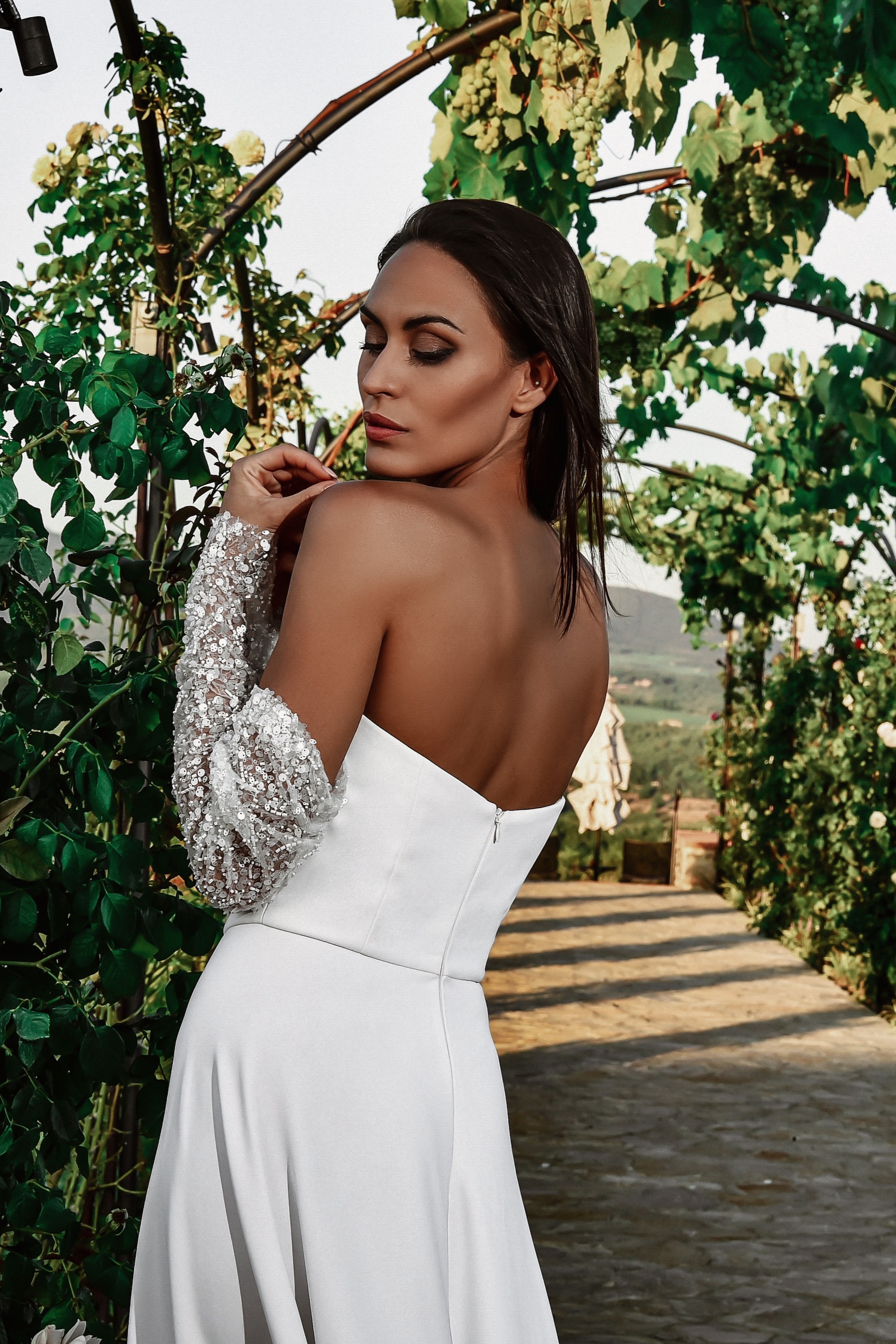 ORSOYA Bridal Dress: Strapless minimal bridal dress with detachable sleeves.